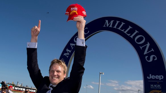 Victory: Bjorn Baker celebrates one of his biggest wins, Unencumbered's success in the 2014 Magic Millions.