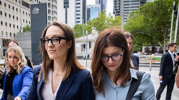 Sally Rugg (left) and her partner, actor Kate McCartney. outside the Federal Court in Melbourne in March.
