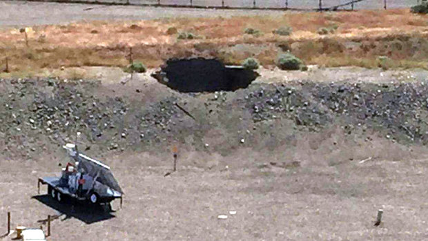 A six-metre by six-metre hole in the roof of a storage tunnel at the Hanford Nuclear Reservation. An emergency was declared in 2017 after the partial collapse of the tunnel that contains rail cars full of radioactive waste. 