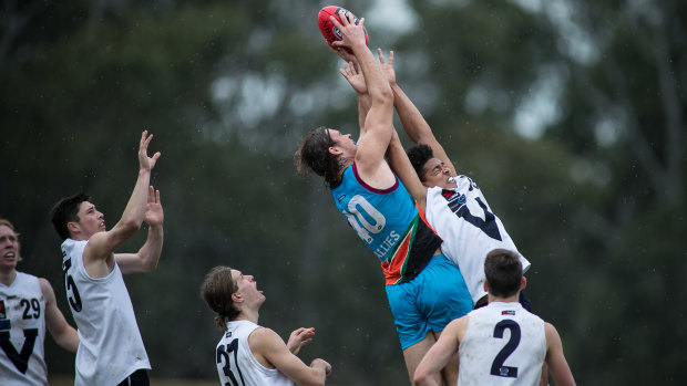 Giants target: Kieren Briggs flies high for the Allies side against Vic Country at the under-18 championships.