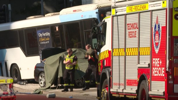 The scene where a woman died after a car and bus crashed in Parramatta.