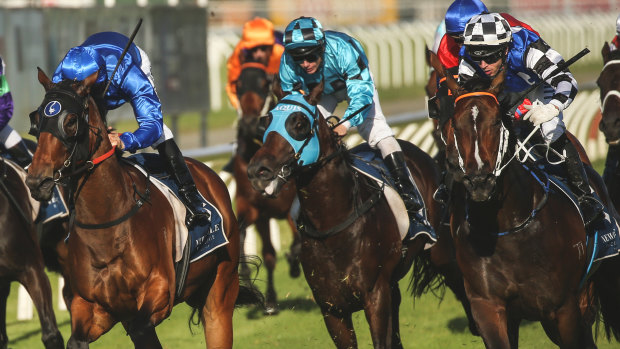 Over the odds: Princess Posh (checked cap) beats Savatiano (royal blue) in the Newcastle Newmarket.