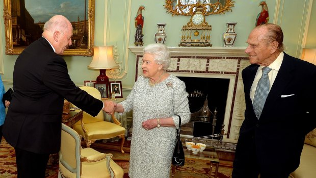 Sir Peter Cosgrove with the Queen and Prince Philip at Buckingham Palace in 2014.