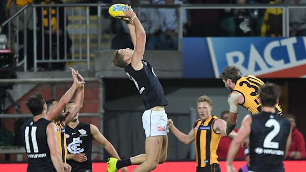 Late lunge: Carlton forward Harry McKay marks inside 50 as the final siren sounds against Hawthorn.