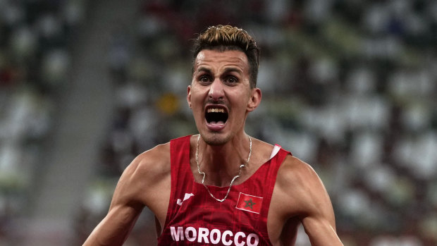 Soufiane El Bakkali, of Morocco, celebrates after winning the men’s 3,000-meter steeplechase.