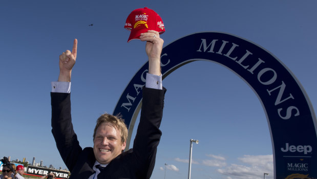 Victory: Bjorn Baker celebrates one of his biggest wins, Unencumbered's success in the 2014 Magic Millions.