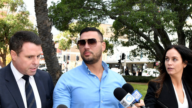 Salim Mehajer arrives at Parramatta District Court on Thursday with a bandaged arm.