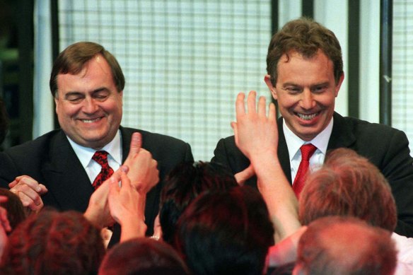 Tony Blair and his deputy leader, John Prescott, are greeted by supporters at a victory rally outside the Royal Festival Hall in London.