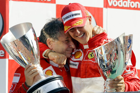 Todt with champion F1 driver Michael Schumacher in 2006 during his days at Ferrari.