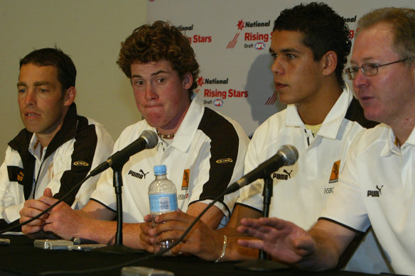 Lance Franklin (second from right), alongside fellow draftee Jarryd Roughead and coach Alastair Clarkson in 2004.