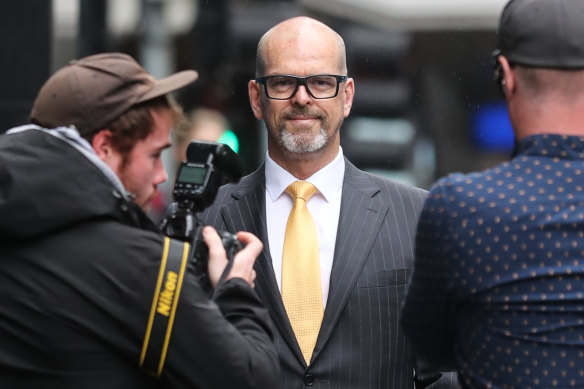 Former police commissioner Simon Overland arrives at the royal commission.