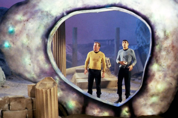 Star Trek stars William Shatner as Captain James T. Kirk and Leonard Nimoy as Mr Spock stand before a time and space portal known as the Guardian of Forever.