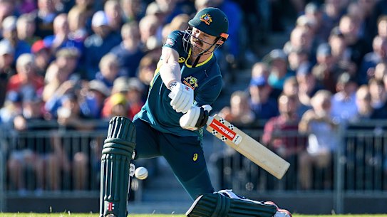 Australia’s Travis Head hits a four during the first T20 International Series Cricket match in Edinburgh, Scotland.