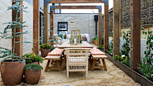 Moving into the courtyard, the judges spirits remained high. Marty was fawning over the arbor. 