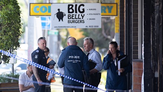 Investigators at the scene of the fire in Caulfield.