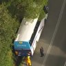 Students rescued after school bus stuck in gutter