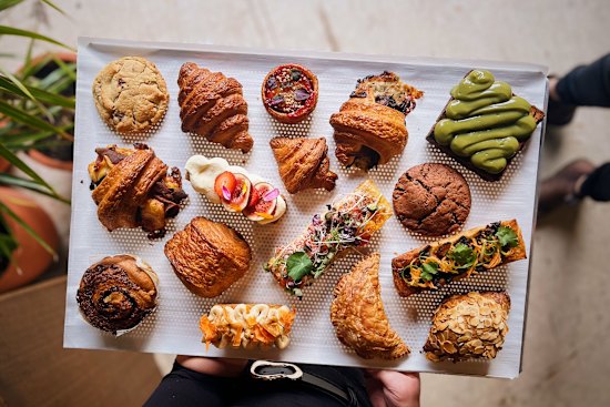 Pastries including pandan kaya croissant toast and mushroom rendang hand pie.