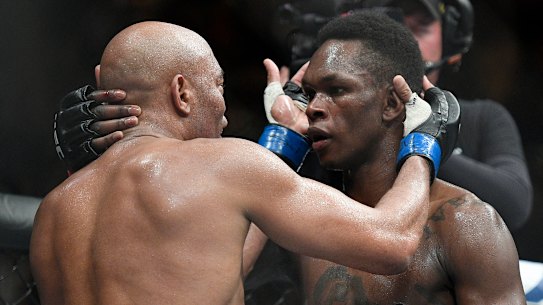 Respect: Adesanya and Silva embrace after their epic contest.