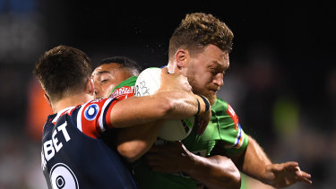 Elliott Whitehead charges into the Roosters defence.