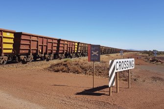 The view for motorists heading through Karijini, the national park on the doorstep of Tom Price, which is also home to vast iron ore operations.
