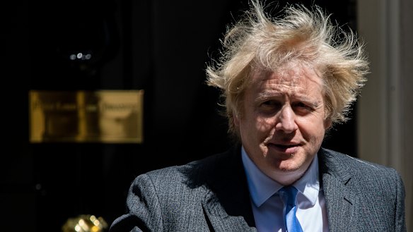Prime Minister Boris Johnson is reopening the economy but says he will not hesitate to reimpose restrictions if the virus flares.