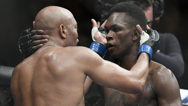 Respect: Adesanya and Silva embrace after their epic contest.