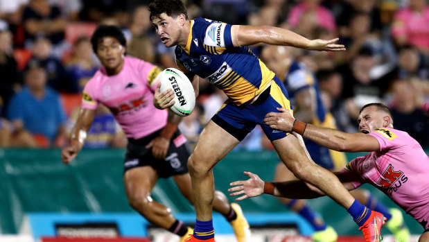 Mitchell Moses attempts to race clear in the trial against the Panthers at Panthers Stadium.