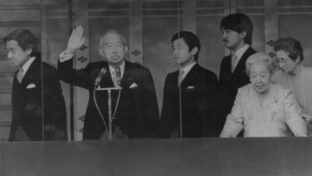 Akihito, left, with his father Hirohito in 1987.