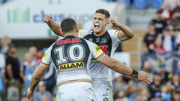 Set to stay: Nathan Cleary, pictured with Reagan Campbell-Gillard, is set to re-sign with the Panthers on a long-term deal.