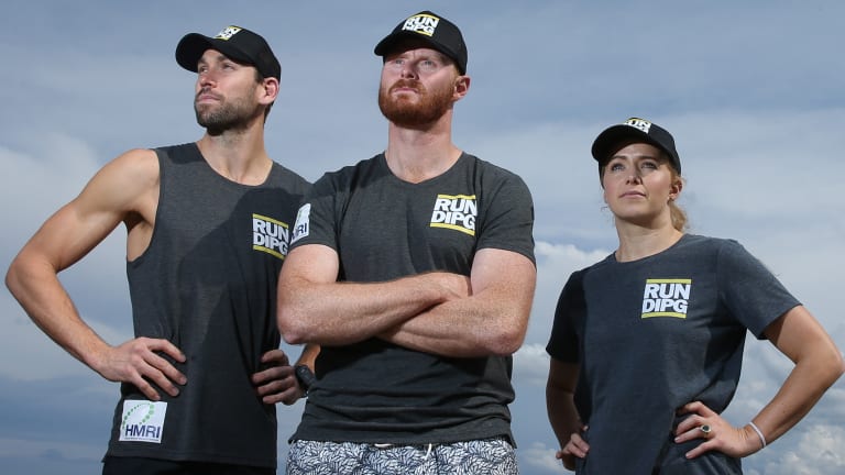 Cancer researcher Dr Matt Dun, centre, with his RUN DIPG team mates Lucas McBeath and Tabitha McLachlan. They are running to bring the world's attention to the deadly brain stem cancer, DIPG. 