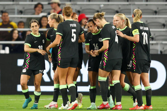 The Matildas celebrate Hayley Raso’s goal.