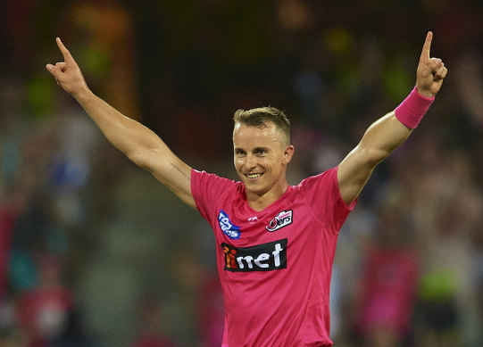 Tom Curran celebrates the Sydney Sixers' pulsating win against the Sydney Thunder on Saturday night.
