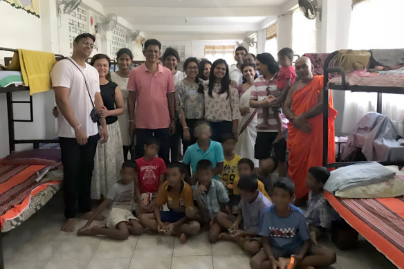 Dr Chamari Jayawardena (second from left) at the orphanage in Sri Lanka