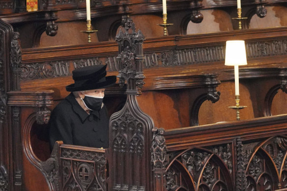 The photo that touched the world: the Queen sitting alone in St George’s Chapel ahead of Prince Philip’s funeral.