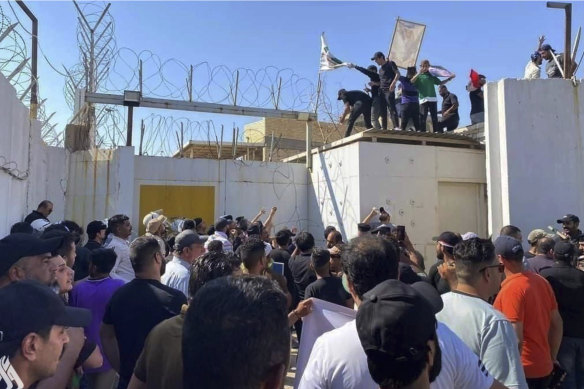 Followers of the influential Iraqi Shiite cleric and political leader Muqtada Sadr storm the Swedish embassy in Baghdad, Iraq. 