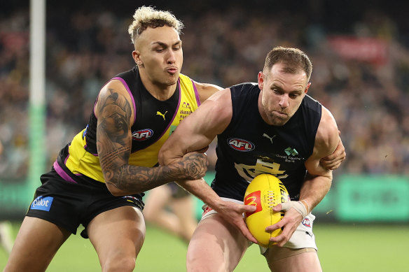 Richmond’s Shai Bolton tangled with Blues defender Sam Docherty on Friday night.