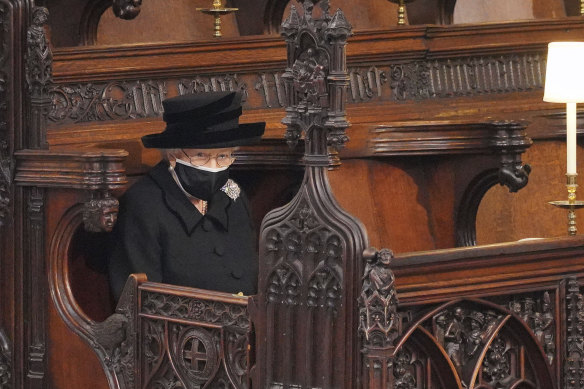 Queen Elizabeth II sitting alone in St George’s Chapel before the funeral of Prince Philip, who had been by her side for 73 years.