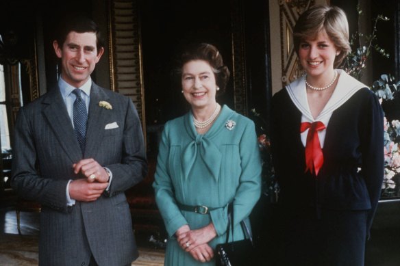 Diana Spencer and Prince Charles pose with Queen Elizabeth II at Buckingham Palace in 1981, after the Queen gave her formal consent to the couple for marriage.