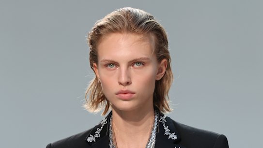 The Rabanne runway displayed a fresh face with a peachy eyeshadow and lip.