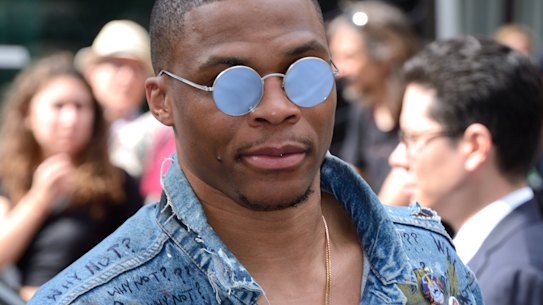 NBA star Russell Westbrook 'self-expresses' at Paris Fashion Week.