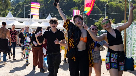 Festival goers enter the gates on Friday.