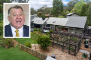 Craig Kelly has bought a home for his wife and children on the Central Coast.