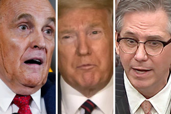 Rudy Giuliani, left, and Bruce Castor, past and present lawyers for former US president Donald Trump, centre.