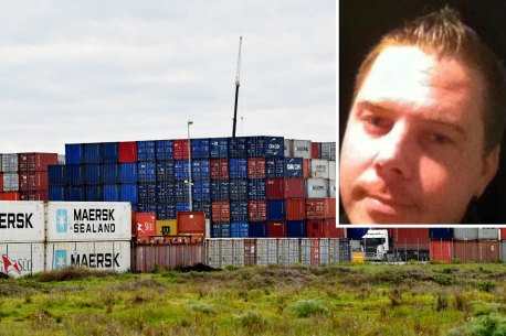 Melbourne trucking boss Troy Kellett (inset) died after falling from a stack of shipping containers in South Australia.