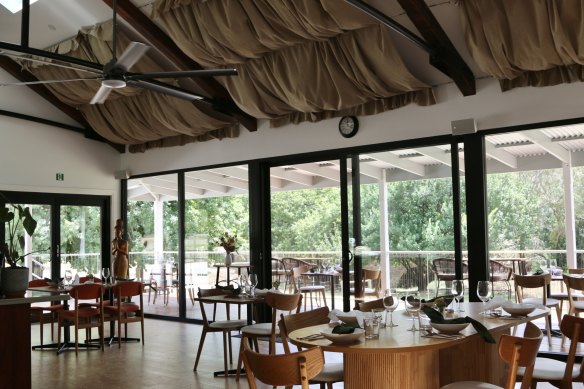 The restaurant’s pitched roof and wide verandah tie into the rural setting.