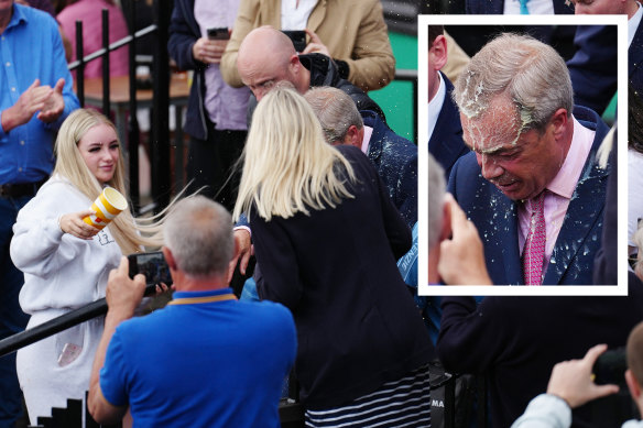 Nigel Farage had a drink thrown over him while launching his candidacy in the British seaside town of Clacton.