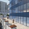 An image showing ClearVue Technologies’ “building-integrated photovoltaic” products consisting of energy-generating solar glazing windows and spandrels.