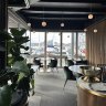 Hanging pendant lights illuminate the LuMi dining room.