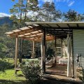 Life revolves around the covered deck at Little Promised Land.