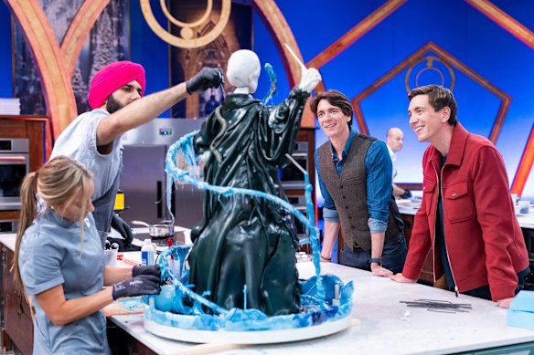 Hosts James and Oliver with contestants Katie Bonzer and Jujhar Mann, as seen on Harry Potter: Wizards of Baking, Season 2.